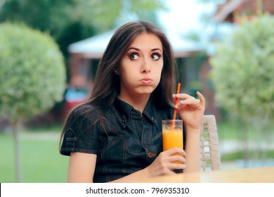 Bored Alone Woman Stood Up on A Restaurant Date.Sad upset customer sitting in diner having awful time waiting for boyfriend