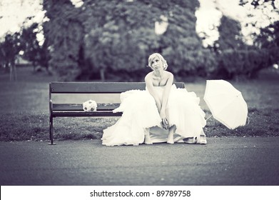 Bored bride in a park