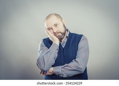 Bored Man Over Grey Background