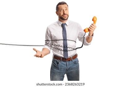Bored man tangled in a rotary phone cable isolated on white background