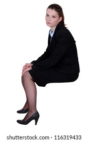 Bored Office Worker Sat On Stool