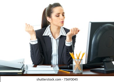 bored office worker works on her nails, holds nailfile in one hand and blow nails on the other one, isolated on white - Powered by Shutterstock