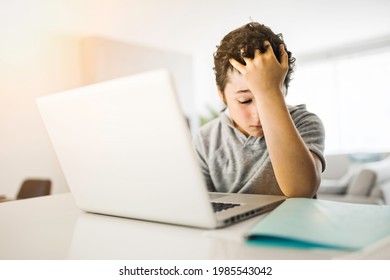 A Bored And Sad Teen Student After Hard Work With Computer