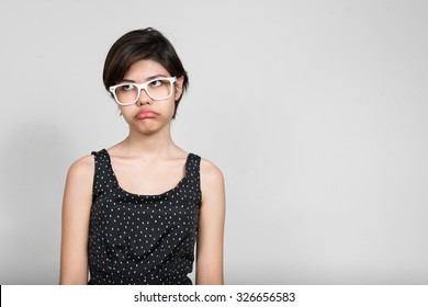 Bored Teenager With White Glasses