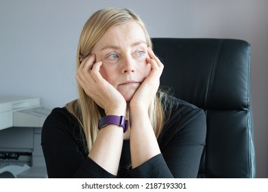 Bored Woman Sitting In The Office