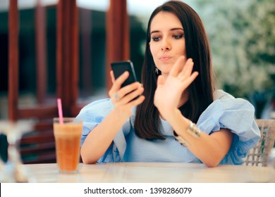 Bored Woman Swiping Men Profiles On Dating App Website. Funny Person Looking For A Date Online On Matrimonial Social Networks
