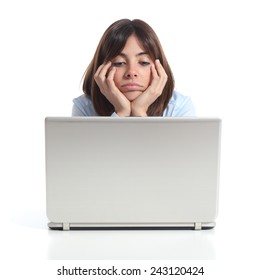 Bored Woman Watching A Laptop Isolated On A White Background