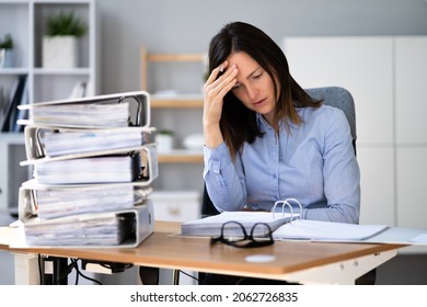 Bored Workaholic Accountant Employee With Headache And Stress - Shutterstock ID 2062726835