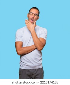 Bored Young Man Yawning Gesture