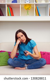 Bored Young Woman Watching Tv