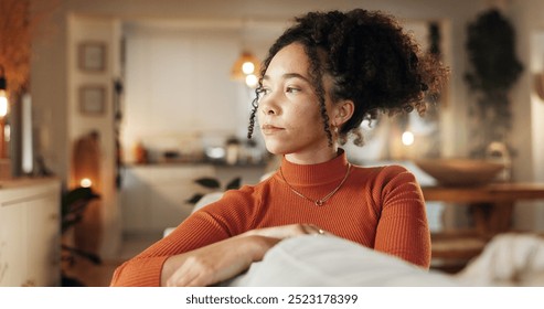 Boredom, face and thinking with woman on sofa in living room of home, planning for future. Idea, mindfulness and vision with serious African person in apartment to relax on weekend for wellness - Powered by Shutterstock