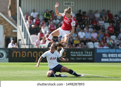 BOREHAMWOOD / UNITED KINGDOM - SUNDAY 25 AUGUST 2019: Vivianne Miedema (top) of Arsenal Women in action against Tottenham Hotspur Women during a friendly match at Meadow Park.