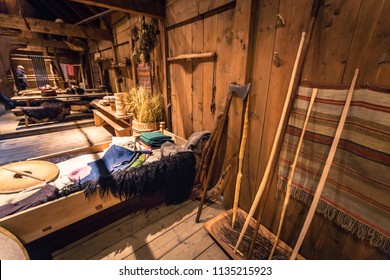 Borg - June 15, 2018: Viking Weapons And Artifacts Inside The Longhouse In The Lofotr Viking Museum At The Town Of Borg In The Lofoten Islands, Norway
