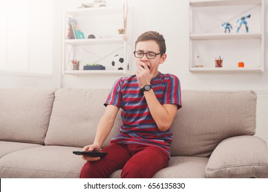 Boring Television, Sleepy Teenager Boy Holding Remote Control, Watching TV Show