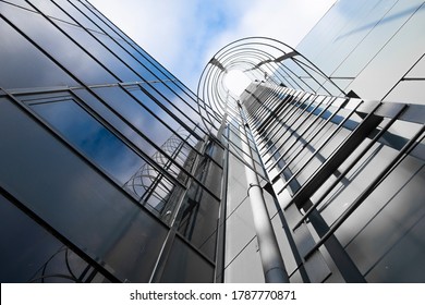BORISOV, BELARUS - JULY 6, 2020: fire escape on a high glass building. fire safety. the geometry of the building