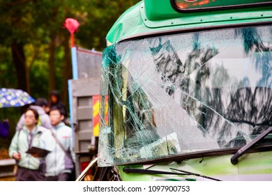 A Borken Minibus Front Window Caused By Traffic Accident