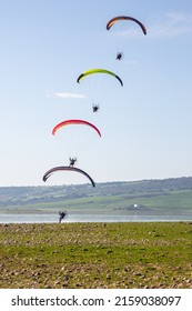 BORNOS, SPAIN - Feb 20, 2020: A closeup of people flying on the paramotors