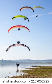 BORNOS, SPAIN - Feb 20, 2020: A closeup of people flying on the paramotors