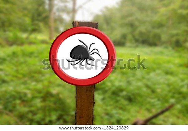 Borreliose and tick warning, round red warning\
sign with tick\
symbol.