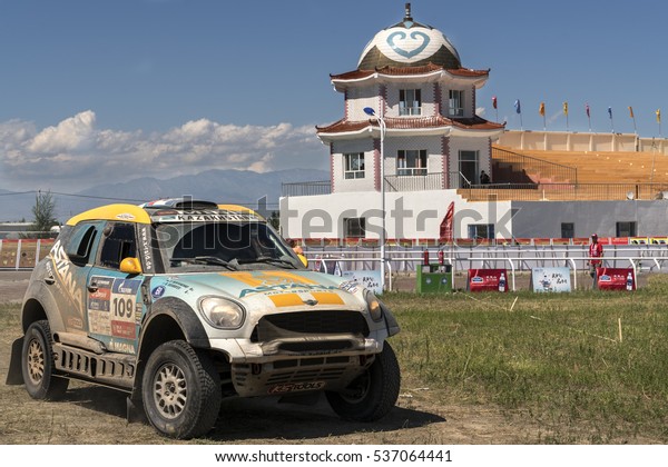 BORTALA, CHINA-JULY 16, 2016: Mechanics cater to
sports cars and trucks day and night during the Silk Way rally
Moscow-Beijing Dakar
series