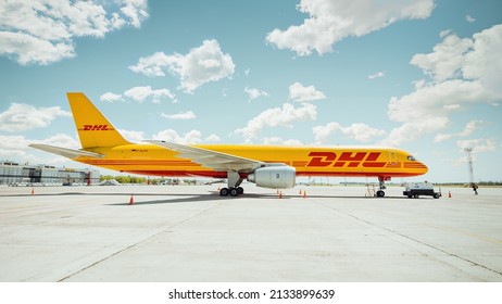 Boryspil International Airport, Ukraine - May 22 2015: DHL cargo Boeing 757 (D-ALED) parked on apron; side view of the aircraft