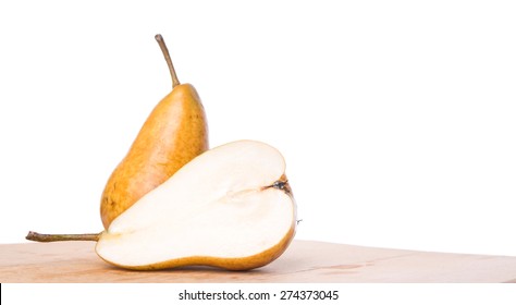 Bosc Pear Fruit On Wooden Surface