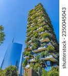 Bosco Verticale in Milan Porta Nuova district also known as Vertical forest skyscrapers. Residential buildings with many trees and other plants in balconies. Ecological green skyscraper
