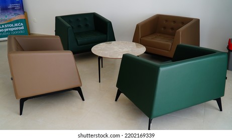 BOSNIA AND HERCEGOVINA, SARAJEVO,12.SEPTEMBAR: Coloured Business Building Lobby With A Modern Designed Leather Chairs And Table For Clients Waiting For  Visit. Modern Chair For Modern Designed Spaces.