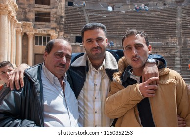 Bosra / Syria - April 17, 2009 : Group Photo Of Three Syrian Men At Bosra Roman Amphitheater.