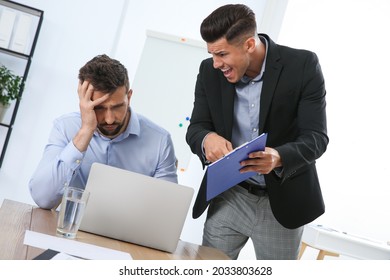 Boss Screaming At Employee In Office. Toxic Work Environment