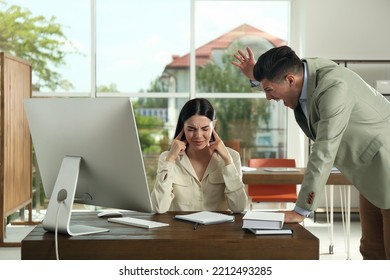 Boss Screaming At Employee In Office. Toxic Work Environment