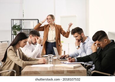 Boss screaming at employees in office. Toxic work environment - Shutterstock ID 2018107532