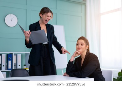 Boss screaming at frustrated employee, bullying and emotional abuse at work. Toxic work environment. Angry female irate boss yelling and shouting at his secretary employee. CEO rebuke for deadline - Shutterstock ID 2112979556