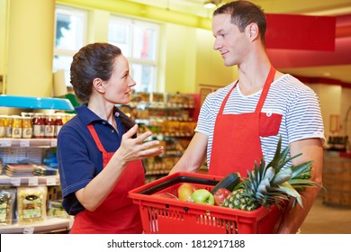 The Boss Is Talking To One Of Her Employees In The Supermarket