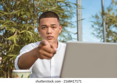 A Bossy Man With An Intimidating Stare Points Sternly. A Customer Complaining About Poor Service. At An Outdoor Alfresco Cafe, Coffee Shop Or Restaurant.