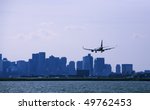 Boston arrival.  Aircraft with city background