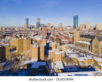 Boston Back Bay modern city skyline in winter including Four Season Hotel at One Dalton Street, Prudential Tower, and John Hancock Tower in Boston, Massachusetts MA, USA.  