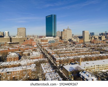 Boston Back Bay modern city skyline including John Hancock Tower in winter in Boston, Massachusetts MA, USA.  