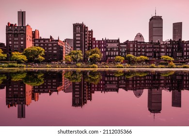 Boston Back Bay Red Brick Buildings and Water Reflections on the Storrow Lagoon at Sunset