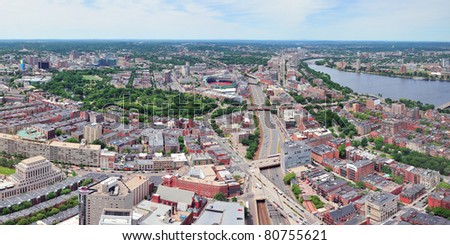 Boston city aerial panorama view with urban buildings and highway.