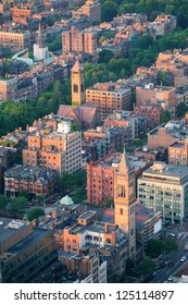 Boston City Downtown Aerial View With Urban Historical Buildings At Sunset.