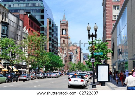 Boston city street view with traffic and historical architecture.