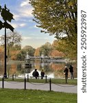 Boston common in autumn cute couple on the bench