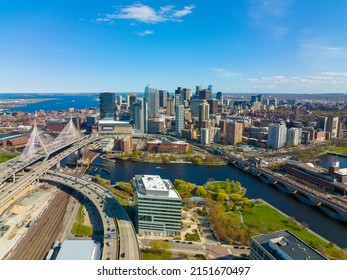 Boston downtown financial district skyline and Leonard Zakim Bridge aerial view, with Boston Harbor and Charles River at the background, Boston, Massachusetts MA, USA. 