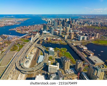 Boston downtown financial district skyline and Leonard Zakim Bridge aerial view, with Boston Harbor and Charles River at the background, Boston, Massachusetts MA, USA. 