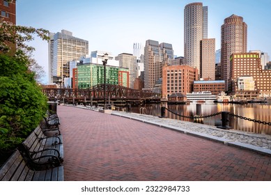 Boston Harbor and Financial District in Boston, Massachusetts, USA at sunrise. - Powered by Shutterstock