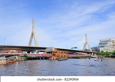 Boston Leonard P. Zakim Bunker Hill Memorial Bridge with blue sky as the famous land mark over Charles River.