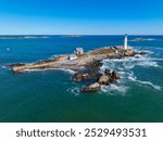 Boston Lighthouse on Little Brewster Island in Boston Harbor, Boston, Massachusetts MA, USA.