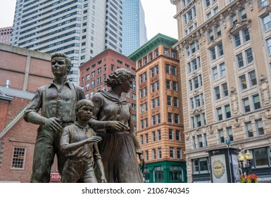 BOSTON, MA - July 3, 2021: View From The Boston Irish Famine Memorial Park Showing The Statue Of A Prosperous Family That Avoided Starving By Emigrating To The United States Before The Great Hunger.