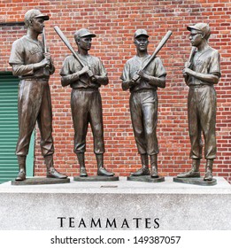 BOSTON, MA - JUNE 4: The Statues Of Ted Williams, Bobby Doerr, Johnny Pesky, And Dom Dimaggio Attract Hundreds Of Baseball Fans To The Fenway Park In Boston, MA For Souvenir Photos On June 4, 2013.